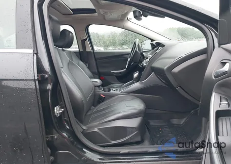 2012 Ford Focus Titanium z USA, uszkodzony, nr VIN 1FAHP3J29CL384353